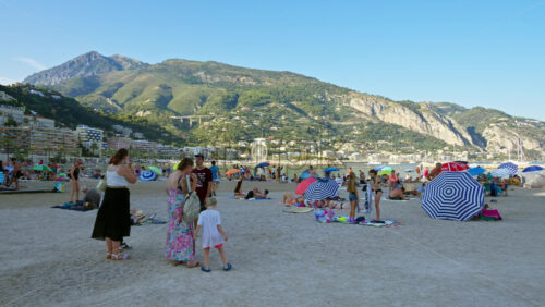Video - Menton, France - September 4, 2024: People walking on the streets near the beach