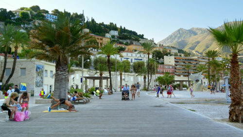 Video - Menton, France - September 4, 2024: People walking on the coastline