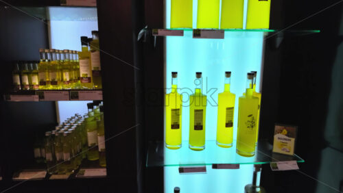 Video - Close up of bottles of limoncello in a store in Menton, France