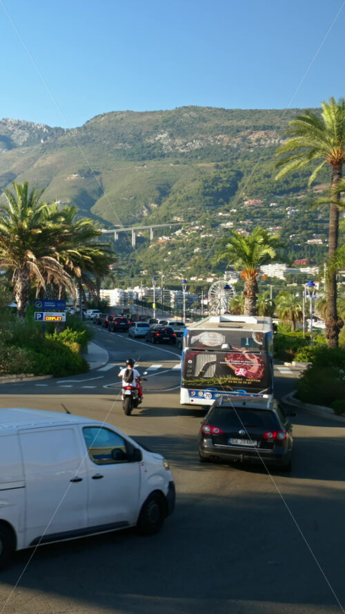 Video - Menton, France - September 4, 2024: Cars moving on the streets of the city. Vertical