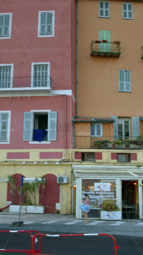 Video - Menton, France - September 4, 2024: Cars moving on the streets of the city. Vertical