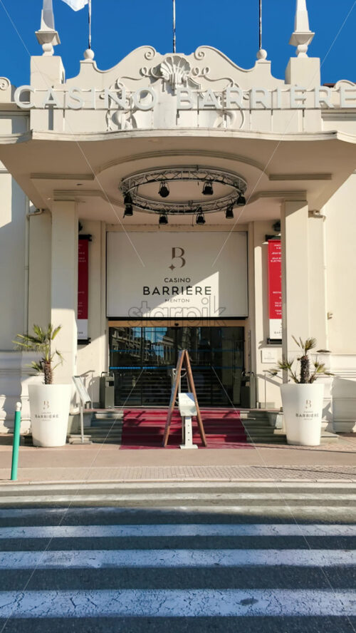 Video - Menton, France - September 4, 2024: Street view of the entrance of the Casino Barriere Menton. Vertical