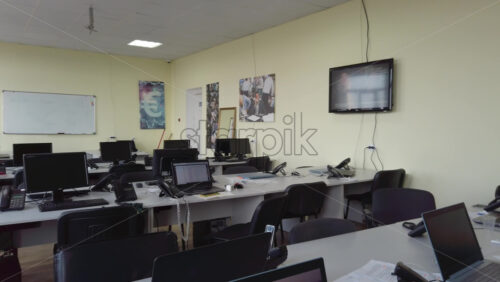 Video - Chisinau, Moldova - April 15, 2021: Multiple computers on desks at an office