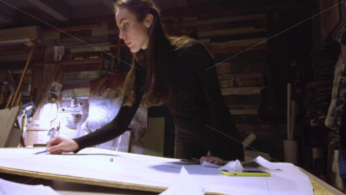 Video - Woman sketching on a canvas at an art gallery workshop