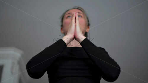 Video - Woman in sportswear doing yoga at home