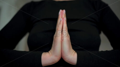 Video - Woman in sportswear doing yoga at home