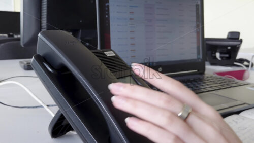 Video - Chisinau, Moldova - April 20, 2021: Man speaking on the telephone in an office