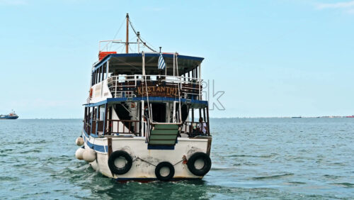 Video - THESSALONIKI, GREECE - SEPTEMBER 21, 2020: KARAVAKIA waterbus leaving the port with people in it