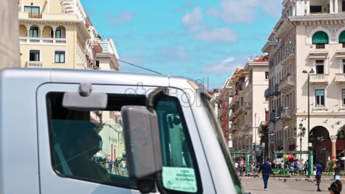 Video - THESSALONIKI, GREECE - SEPTEMBER 21, 2020: An overview of historic buildings and people passing by