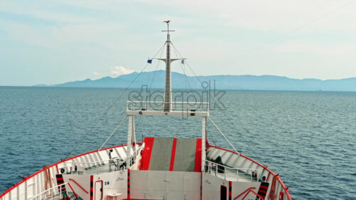 Video - View of the Aegean sea from a ferryboat with visible prow of the ship, Thassos island in the distance, Greece