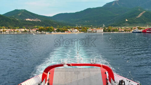 Video - View of the Thasos island from a ferryboat, flying seagulls, waves, seething water, Greece