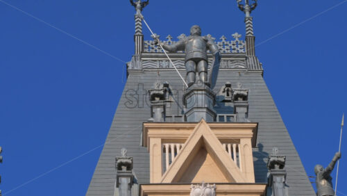 Video - Iasi, Romania - April 25, 2021: Close up of pink magnolia trees in front of the Palace of Culture