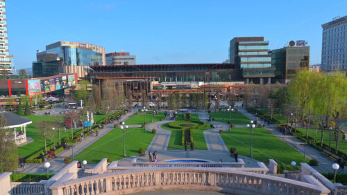 Video - Iasi, Romania - April 25, 2021: View of the garden in the back of the Palace of Culture on a sunny day