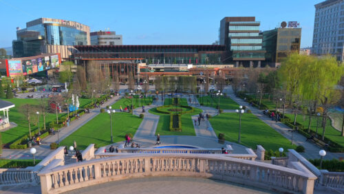 Video - Iasi, Romania - April 25, 2021: View of the garden in the back of the Palace of Culture on a sunny day