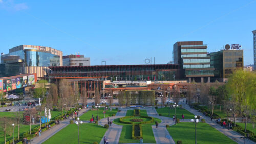 Video - Iasi, Romania - April 25, 2021: View of the garden in the back of the Palace of Culture on a sunny day