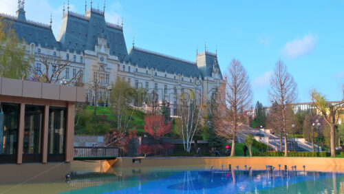 Video - Iasi, Romania - April 25, 2021: Backside view of the Palace of Culture on a sunny day