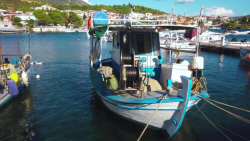 Video - NEOS MARMARAS, GREECE - OCTOBER 8, 2020: Aegean sea port with multiple moored yachts and boats, clear weather. Slow motion