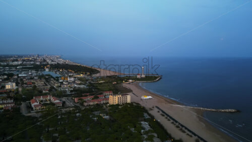 Aerial drone view of Cavallino-Treporti in the Venetian Lagoon in northern Italy in the evening - Starpik Stock