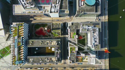 Aerial drone view of Dublin’s Grand Canal Dock and surrounding modern architecture in the Docklands area - Starpik Stock