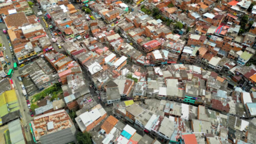 Aerial drone view of Medellin, historic hillside town in Colombia in daylight - Starpik Stock