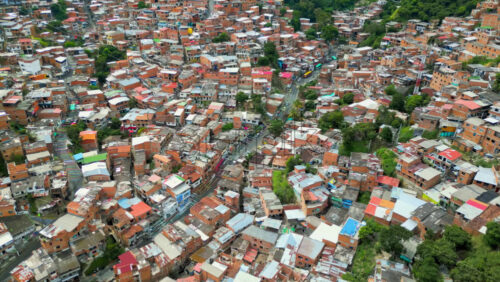 Aerial drone view of Medellin, historic hillside town in Colombia in daylight - Starpik Stock