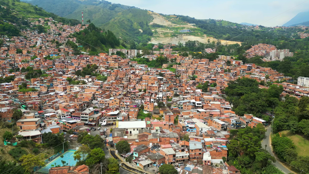 Aerial drone view of Medellin, historic hillside town in Colombia in daylight - Starpik Stock