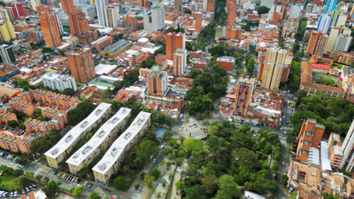 Aerial drone view of Medellin, historic hillside town in Colombia in daylight - Starpik Stock