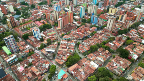 Aerial drone view of Medellin, historic hillside town in Colombia in daylight - Starpik Stock