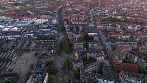 Aerial drone view of Vesterbro district in Copenhagen, Denmark at sunset - Starpik Stock