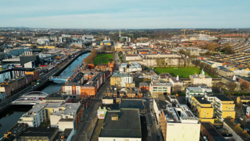 Aerial drone view of bridges over the River Liffey in Dublin, Ireland in daylight - Starpik Stock
