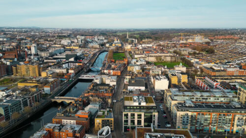 Aerial drone view of bridges over the River Liffey in Dublin, Ireland in daylight - Starpik Stock