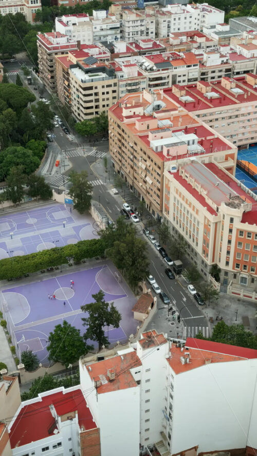 Aerial drone view of stadiums near buildings in Valencia, Spain. Vertical - Starpik Stock
