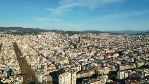 Aerial drone view of the Gothic Quarter in Barcelona, Spain, with the iconic Barcelona Cathedral standing at the center - Starpik Stock