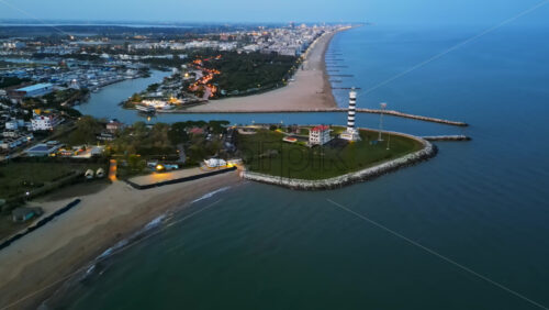 Aerial drone view of the Light House Faro di Piave Vecchia in Cavallino-Treporti, Metropolitan City of Venice, Italy - Starpik Stock