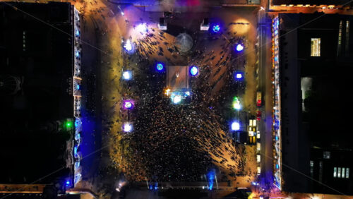 Aerial drone view of the Plaza de Bolivar in Bogota at night, during a massive public gathering - Starpik Stock