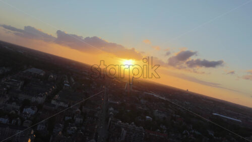 Aerial drone view of the buildings in Copenhagen, Denmark at sunset - Starpik Stock
