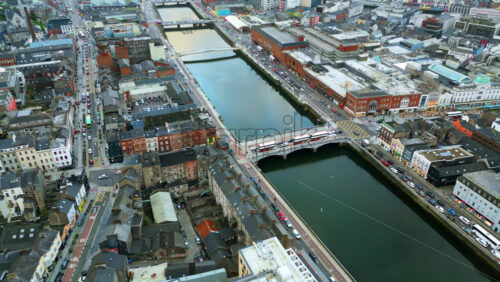 Aerial drone view of the center of Cork city in Ireland in daylight - Starpik Stock