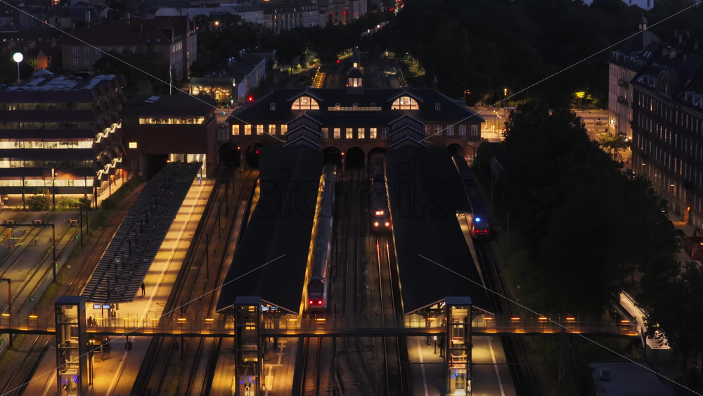Aerial drone view of the platforms and historic station building, Copenhagen, Denmark - Starpik Stock