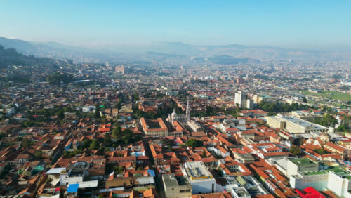 Aerial drone view of the skyline of Bogota, Colombia in daylight - Starpik Stock