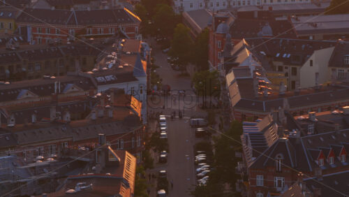 Aerial drone view over historic brick buildings and busy streets in the Vesterbro neighborhood - Starpik Stock