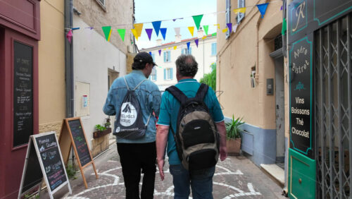 Antibes, France – July 20, 2025: People walking on the streets of the city on a cloudy day - Starpik Stock