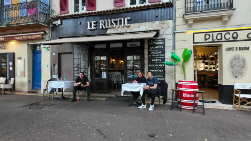 Antibes, France – July 20, 2025: People walking on the streets of the city on a cloudy day - Starpik Stock