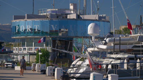 Antibes, France – June 7, 2025: Multiple white boats docked in the Port Vauban in daylight - Starpik Stock