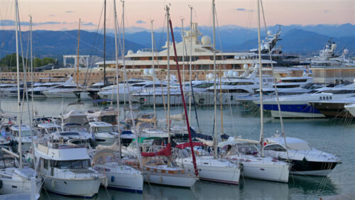 Antibes, France – June 7, 2025: Multiple white boats docked in the Port Vauban in daylight - Starpik Stock