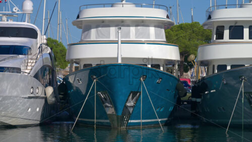 Antibes, France – June 7, 2025: Multiple white boats docked in the Port Vauban in daylight - Starpik Stock