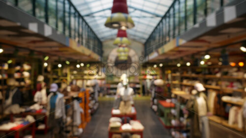 Blurred view of a clothing store with bright lights - Starpik Stock