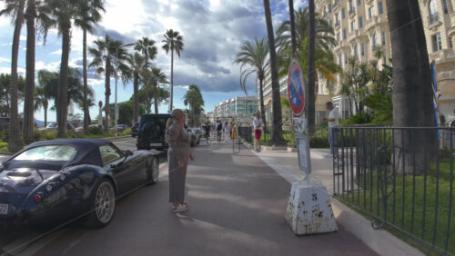 Cannes, France – July 10, 2025: People walking on the streets of the city in daylight - Starpik Stock