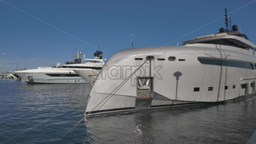 Cannes, France – July 11, 2025: View of boats docked in the Cannes marina in daylight - Starpik Stock