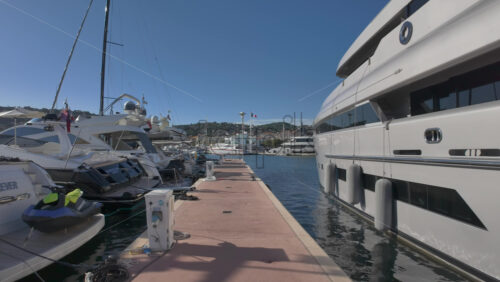 Cannes, France – July 11, 2025: View of boats docked in the Cannes marina in daylight - Starpik Stock