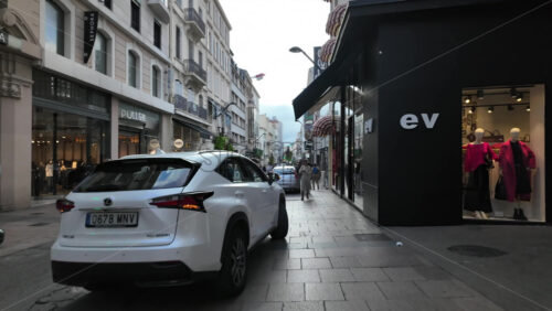 Cannes, France – July 12, 2025: People walking on the streets of the city on a sunny day - Starpik Stock